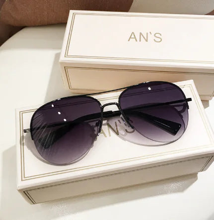 Sunglasses with Semi-Framed Edge Design